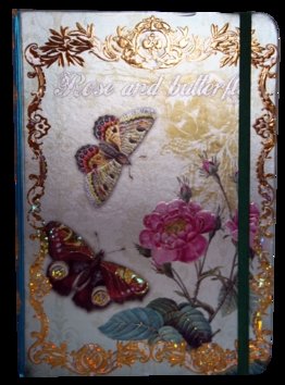 Levně Zápisník s gumičkou A5 145x210 mm růže a motýli